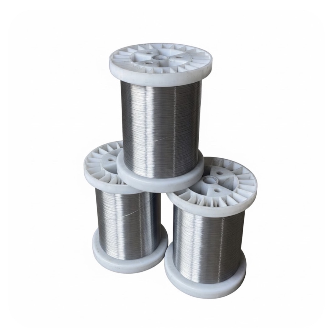 Annealed stainless steel wire on spools, used for weaving stainless steel wire mesh.